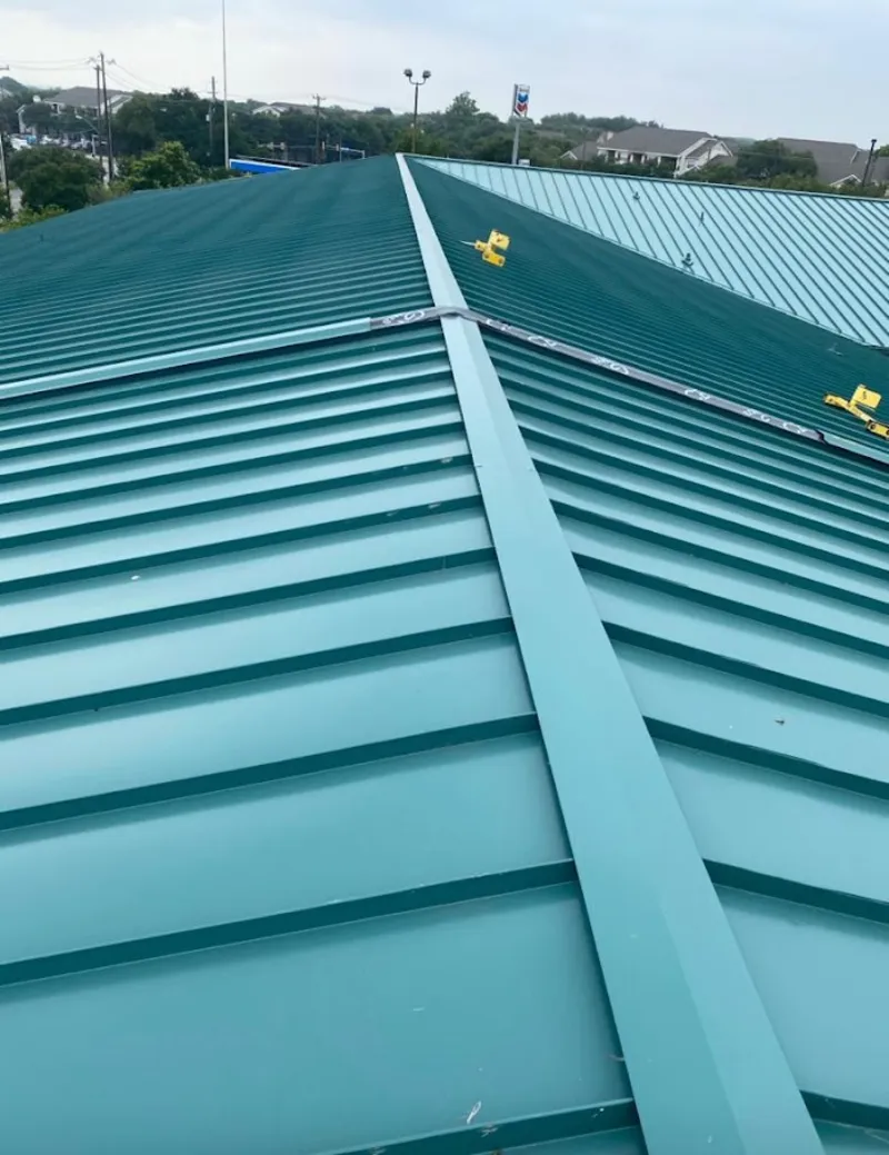 Green commercial metal roof ridge and valley for Metal Roof Repair in Skowhegan